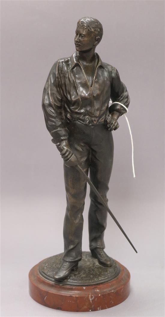 A bronze of a fencer, on marble base height 31cm